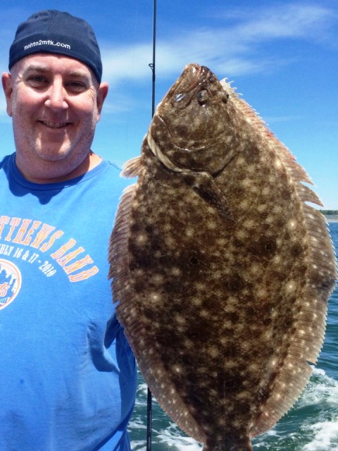mike with fluke fish